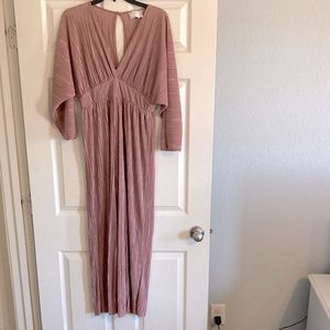 Beautiful and comfortable Low v neck line pant set romper.